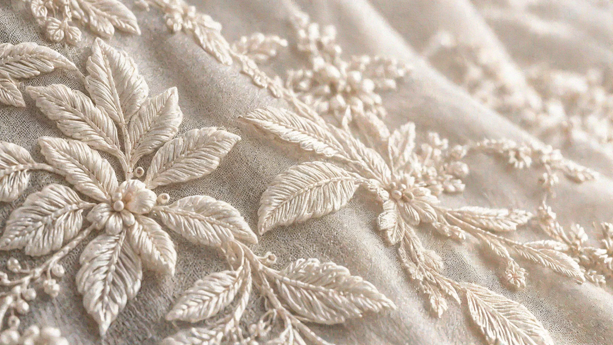 Material study: raised ivory leaf embroidery on fine tulle